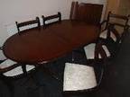 Dark wood extendable 8 seat dining table 8 place (2....